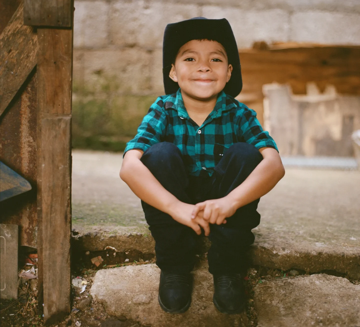 Junior sitting and smiling